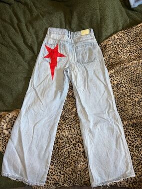 ZARA Light Wash Wide Leg Jeans with Red Star Accent